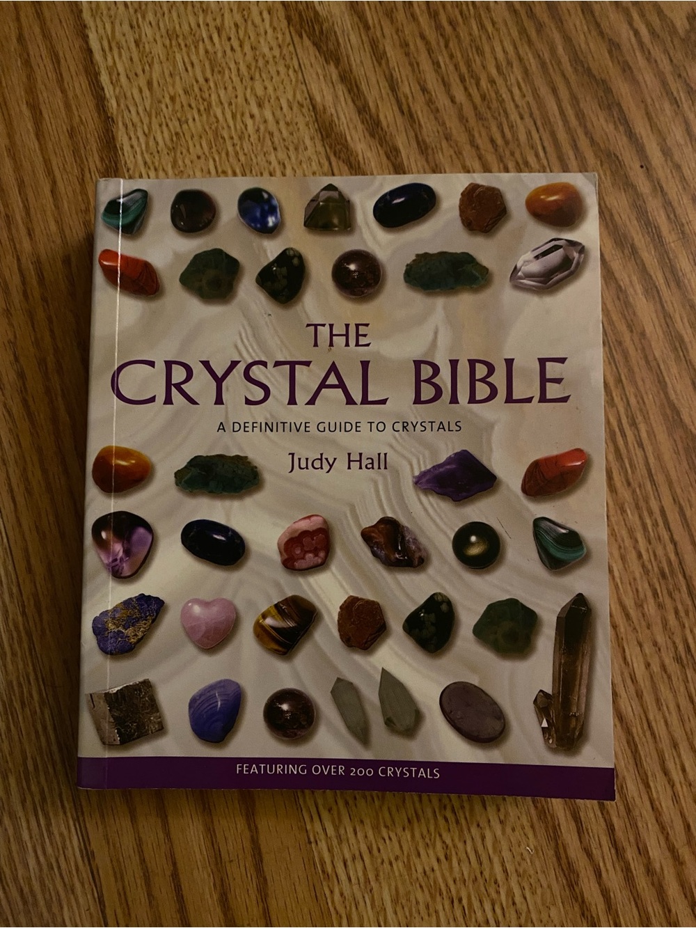 The Crystal Bible by Judy Hall - Purple & Cream Cover